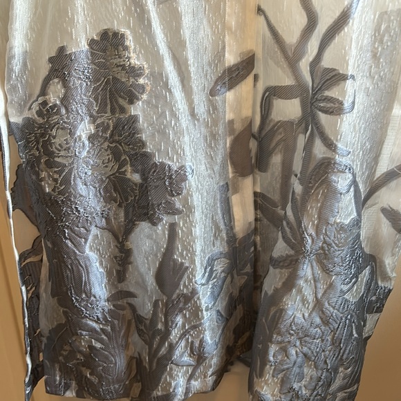 This is a beautiful gray duster. Never worn. Price 149.00 price tag still on - Picture 5 of 6